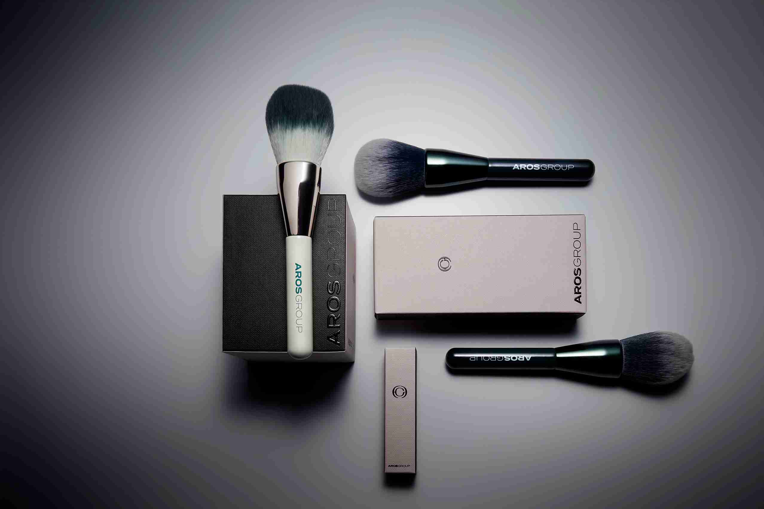 Luxury makeup accessories including professional brushes and cases